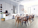 This picture used to market laminate flooring also includes table porcelain products and lamps from Villeroy & Boch